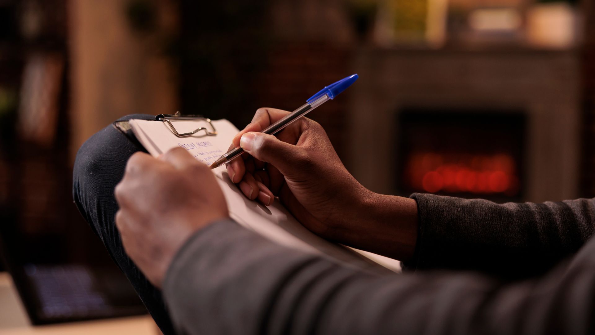 psychology-specialist-taking-notes-at-couple-therapy